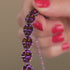 Nyx | Purple Hematite Skulls x Violet GloWeave | Macrame Bracelet